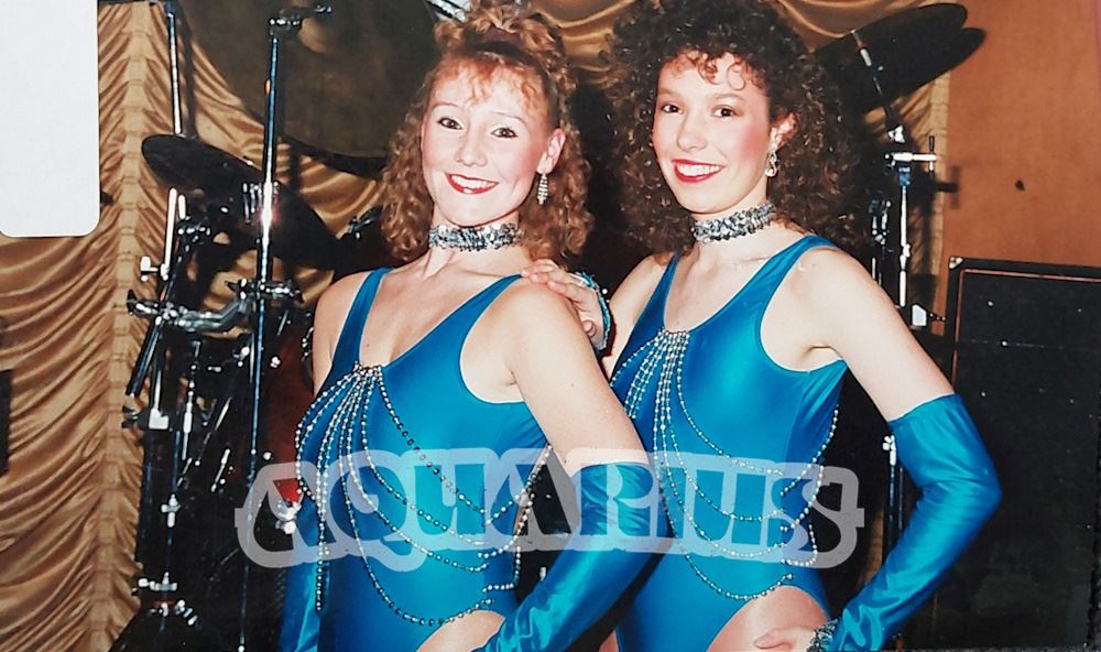 Female dancers in blue leotards