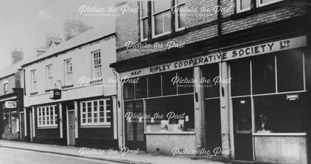 Ripley Co-op, pub and Dilks hairdressers on Grovesnor Road, Ripley, 1960s