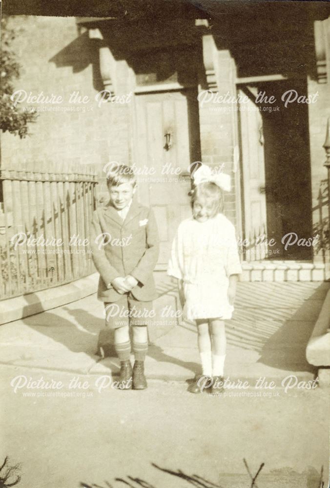 Harold and Edith Lambert outside their house in Belper