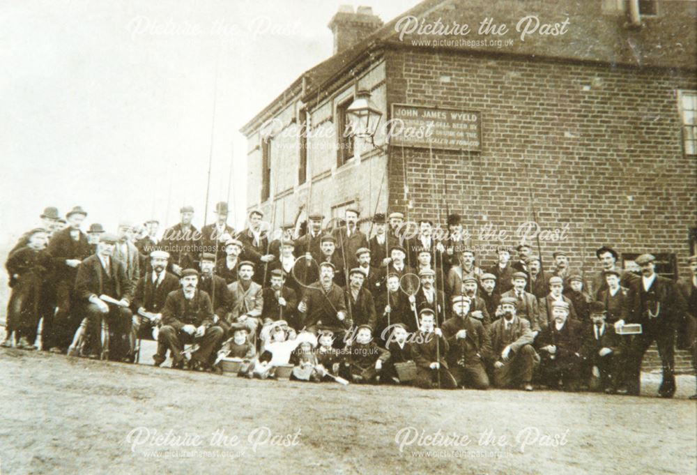 Group of fishermen outside the Anchor pub