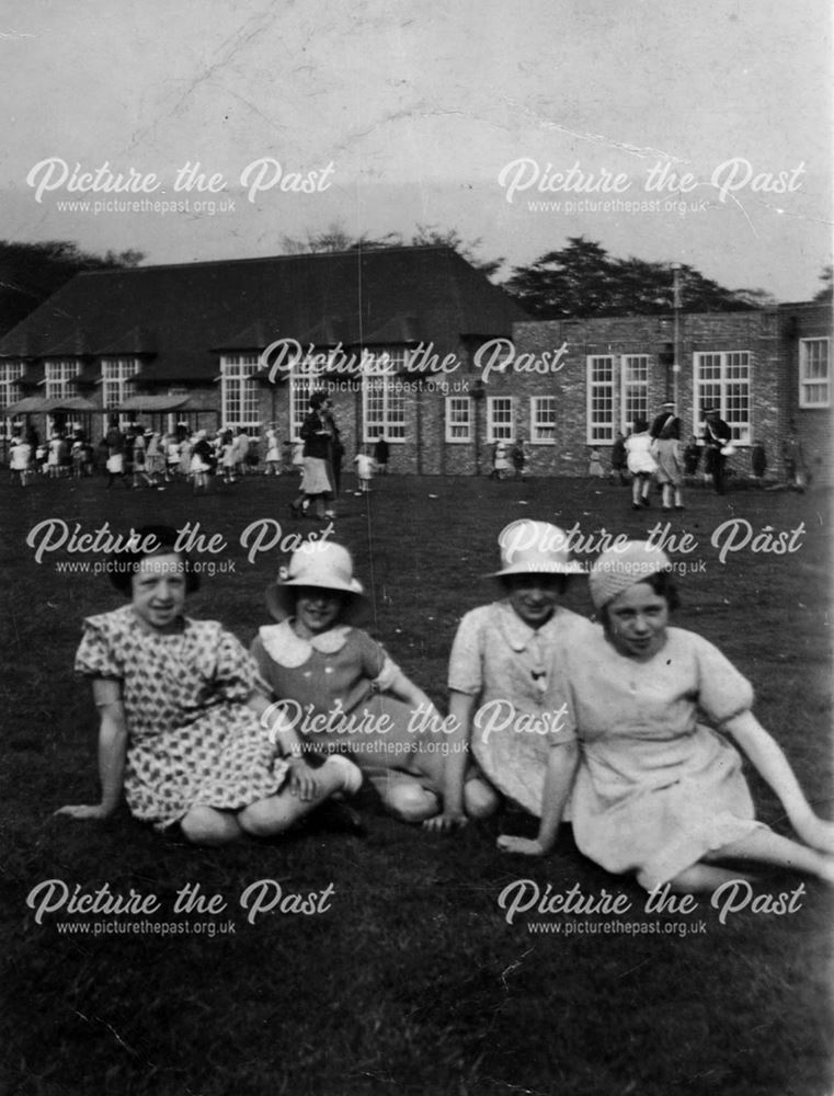 Group of friends, posing for the camera, on the occasion of a royal jubilee.