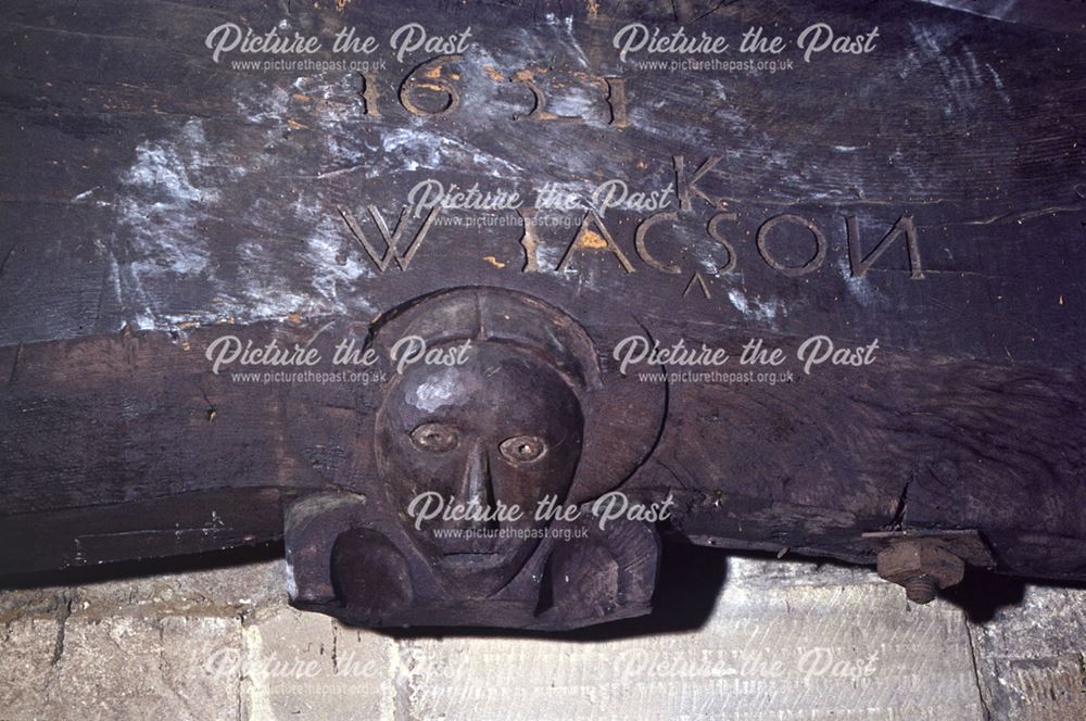 Carving in beam in Chancel Arch, Duffield, dated 1621