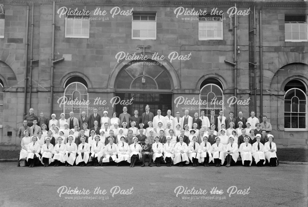 Staff group standing outside the Devonshire Royal Hospital, Buxton,
