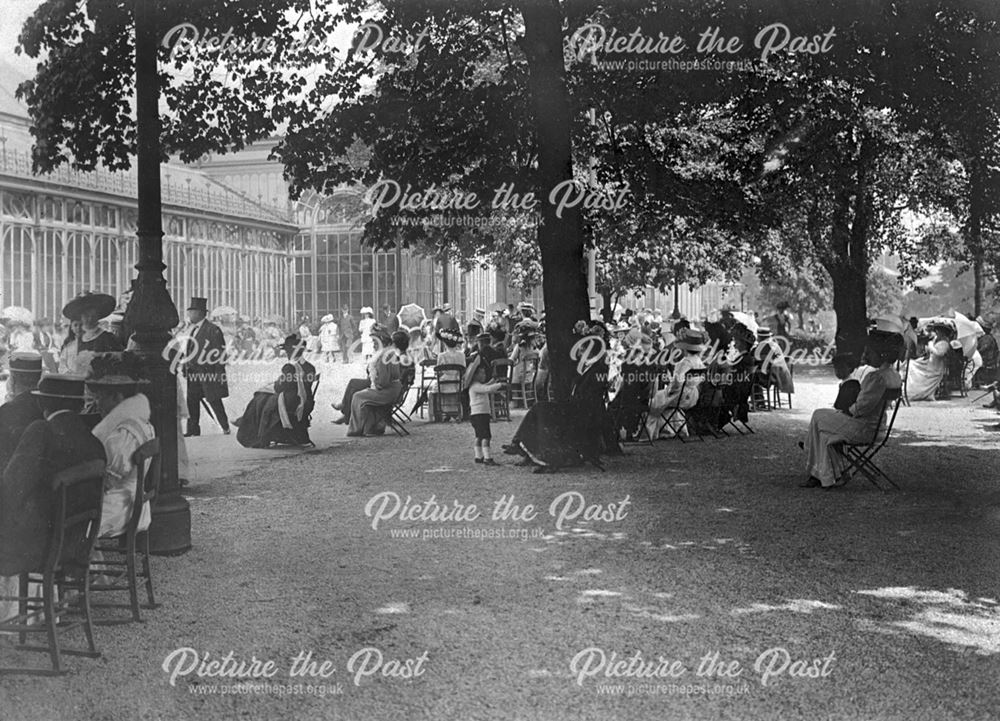 General scene showing people at leisure sitting by the Pavilions, Pavilion Gardens, Buxton