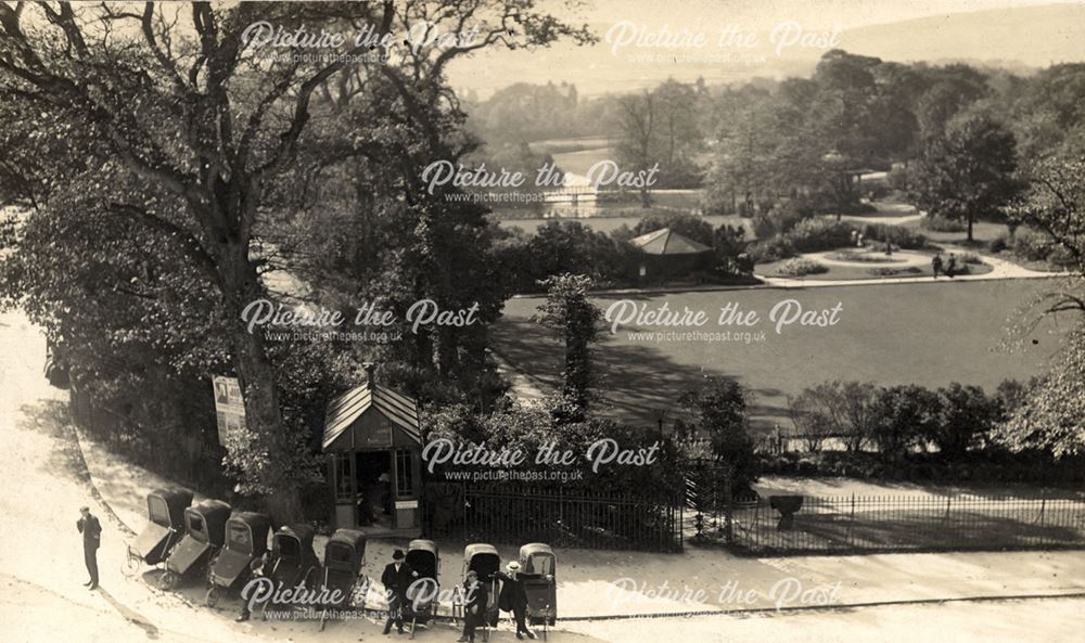 The corner of the Pavilion Gardens with bath chairs