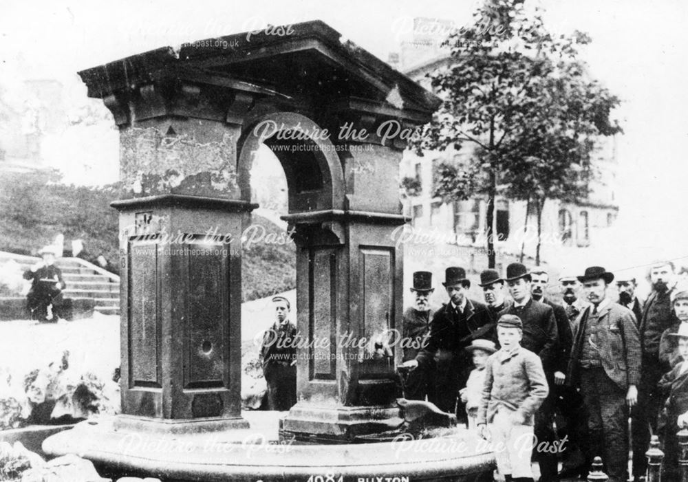 Old Pump with lots of people