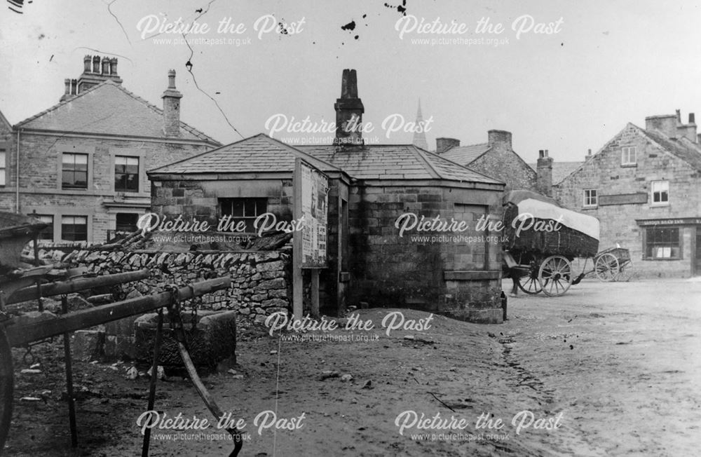 Back of the Toll Cottage with wagons