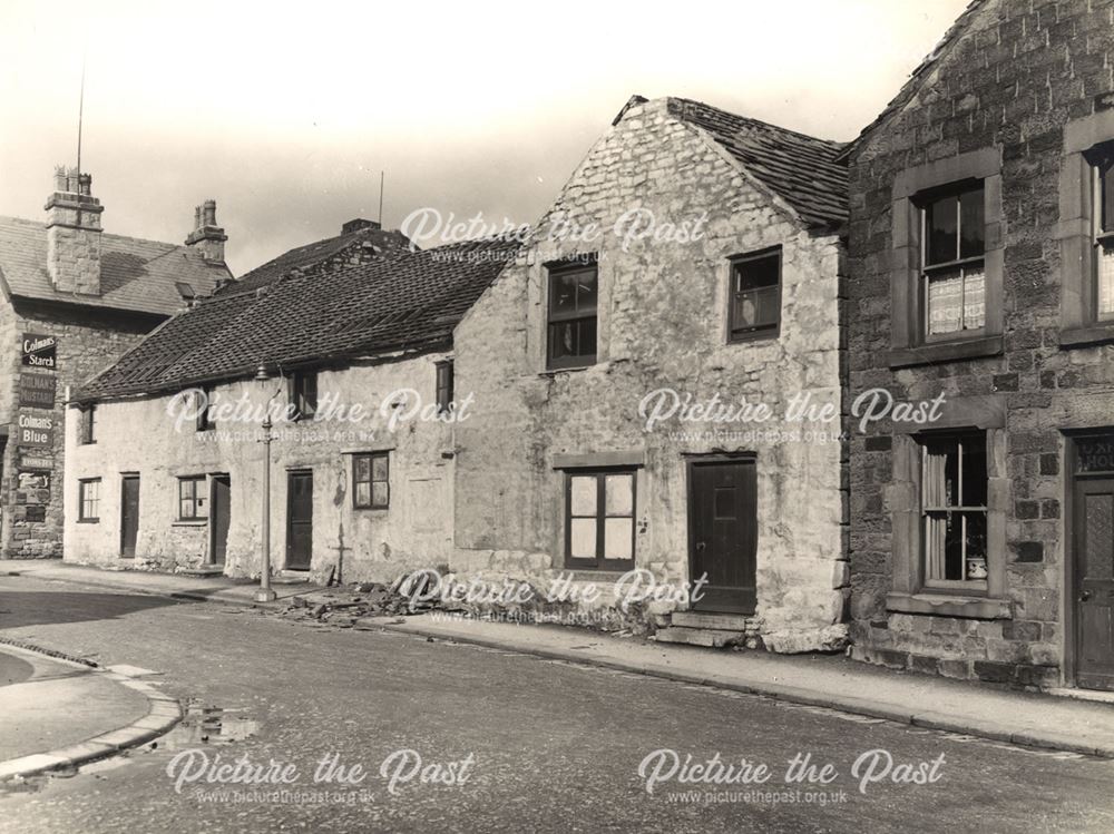 Old cottages on Bath Road. Now demolished