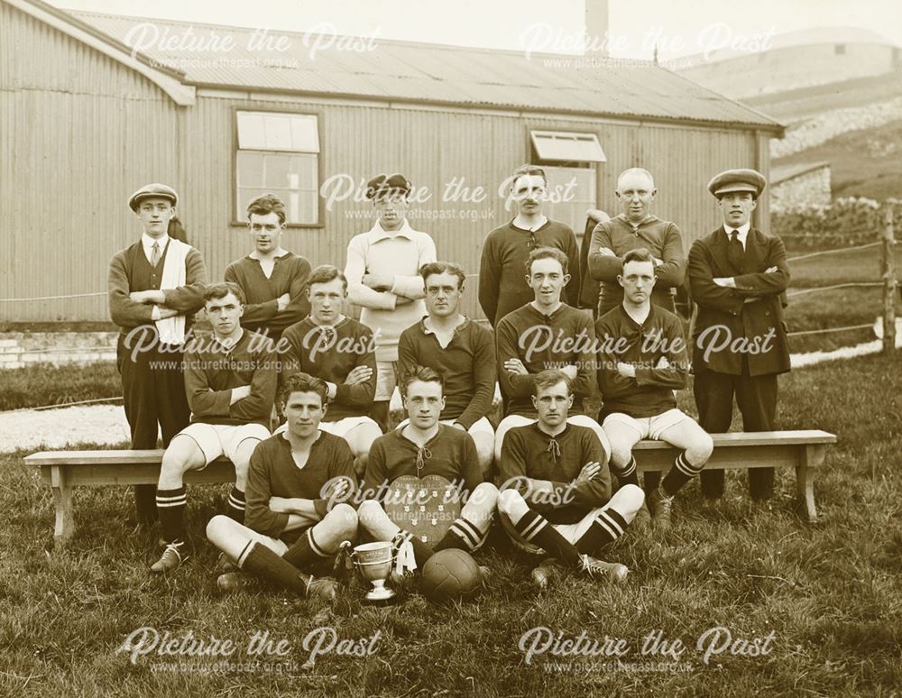 This photo was taken outside Harpur Hill Club. Of what was the football team in the 1920's.