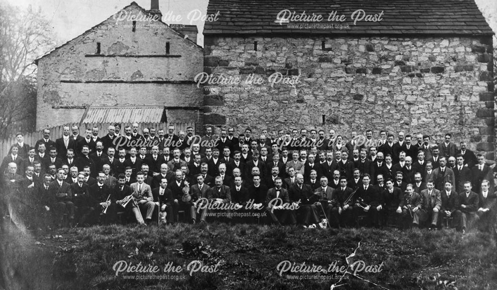 Group of men at an unknown location, undated