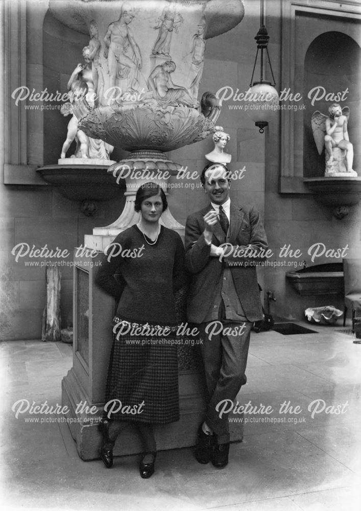 Lady Rachel Cavendish and Hon John Stuart in the Sculpture Gallery, Chatsworth, 1923