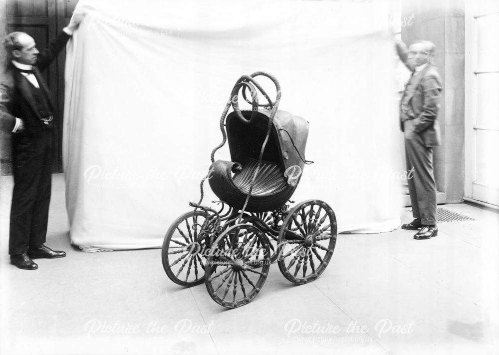 Child's carriage in form of sea shell at Chatsworth 1923