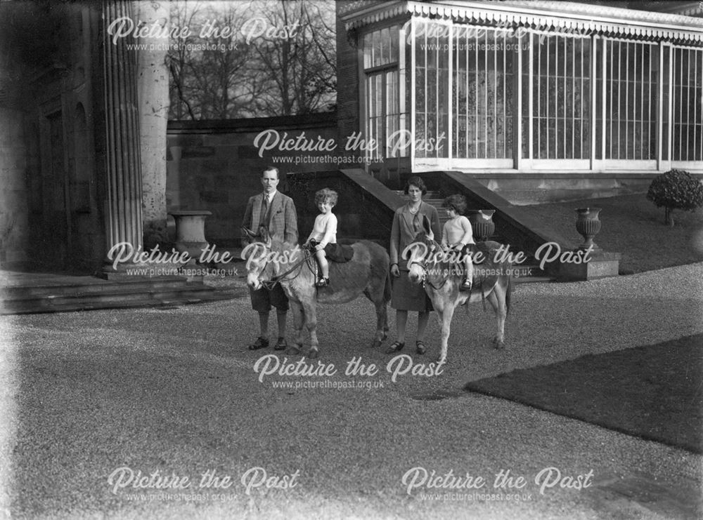 James and Rachel (nee Cavendish) Stuart at the Peach House, Chatsworth with two of their children ri