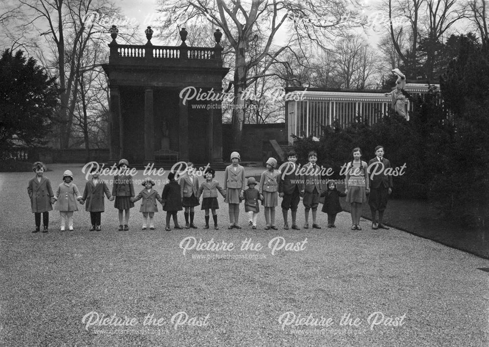 Cavendish family group of 16 grandchildren in the gardens of Chatsworth, Christmas 1929