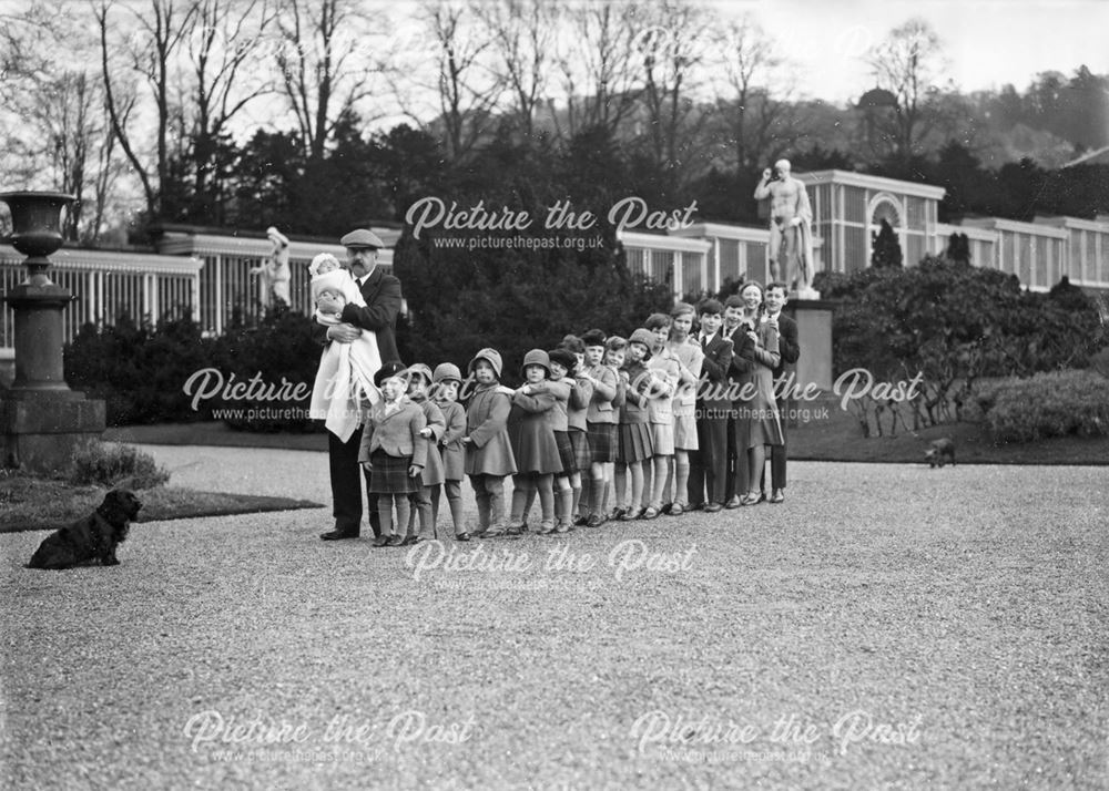 9th Duke of Devonshire 17 of his grandchildren in the gardens at Chatsworth, 1930