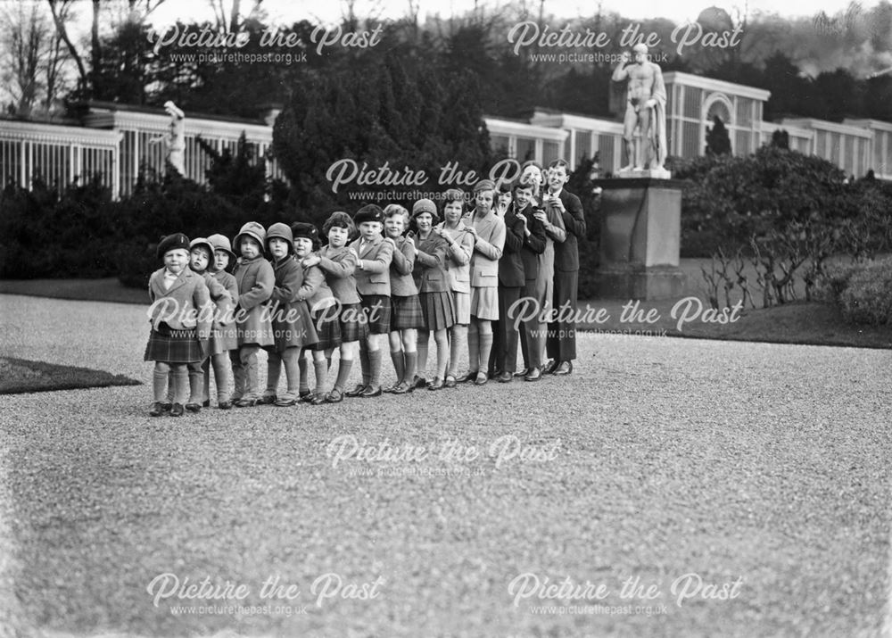 Sixteen of the grandchildren of the 9th Duke of Devonshire in the gardens at Chatsworth, 1930