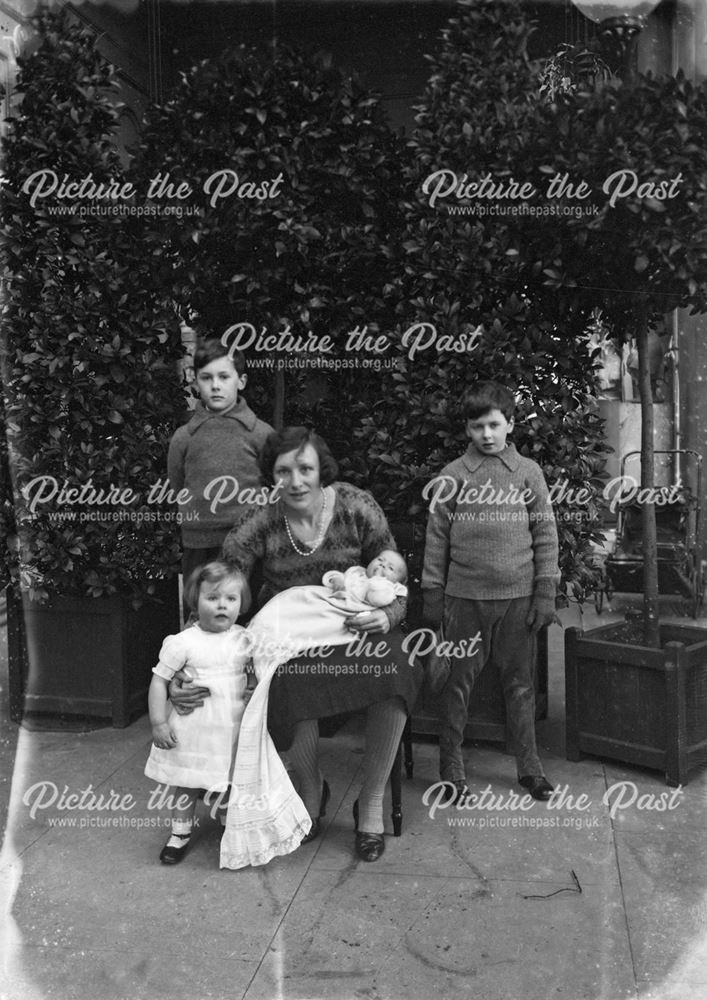 Lady Hartington, with Billy (left) and Andrew, Elizabeth and Ann (in the christening gown) at Chatsw