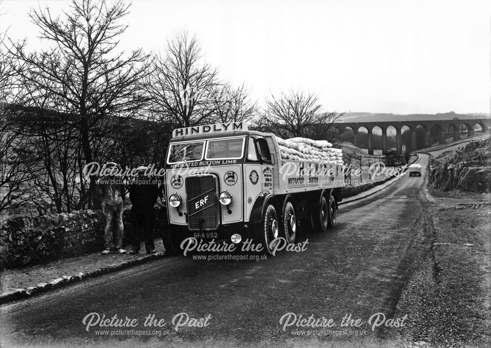 Two drivers with ERF eight wheeler lorry loaded with Hyndlym lime, Dukes Drive, Buxton, 1938        