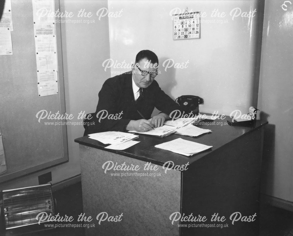 Man working at desk, The Milk Marketing Board, Brook House, Fairfield, Buxton, 1957                 