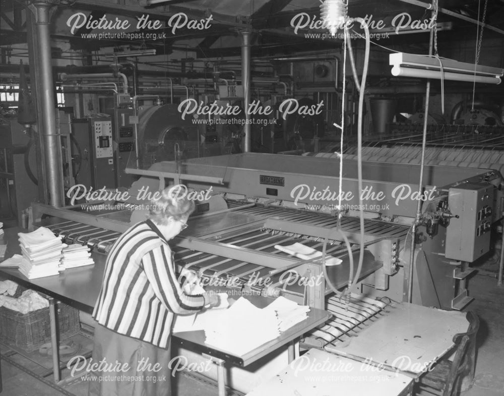 Pressing and finishing machine, IXL Laundry, Charles Street, Buxton, 1968                           