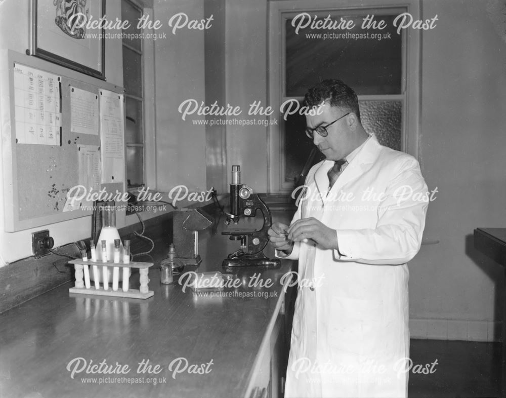 Mr. Stephenson carrying out a milk test, The Milk Marketing Board, Fairfield, Buxton, 1949          