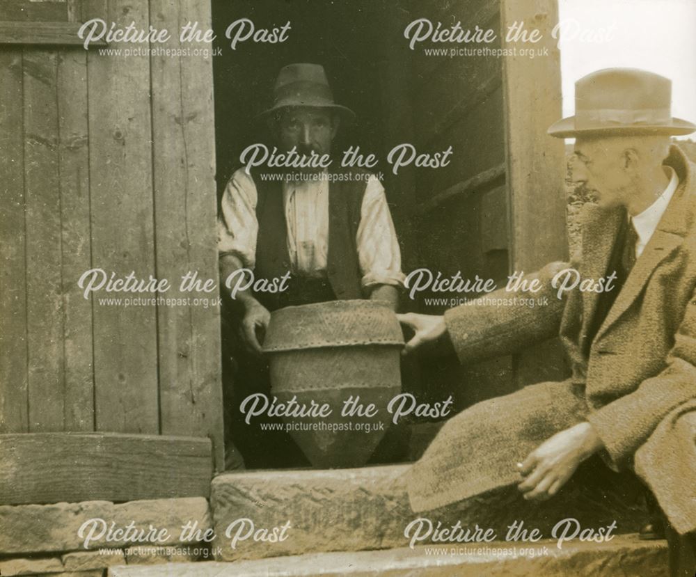 Man displaying an Urn, Stanton Moor, Stanton in the Park, c 1920s