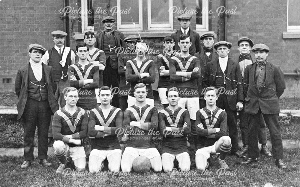 Football team outside the Victoria Hotel 1920