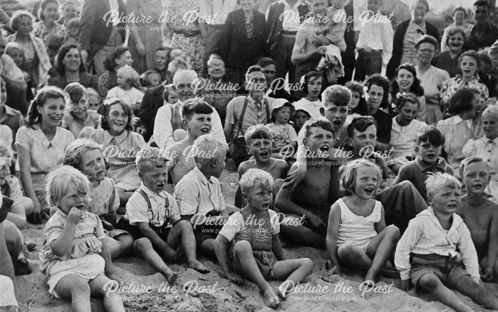 Group of children watching an entertainment at the Miners Holiday Camp