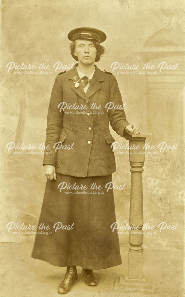 Studio portrait of a woman in uniform