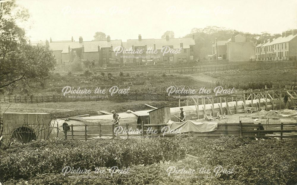 Workmen building a culvert by Spital allotments