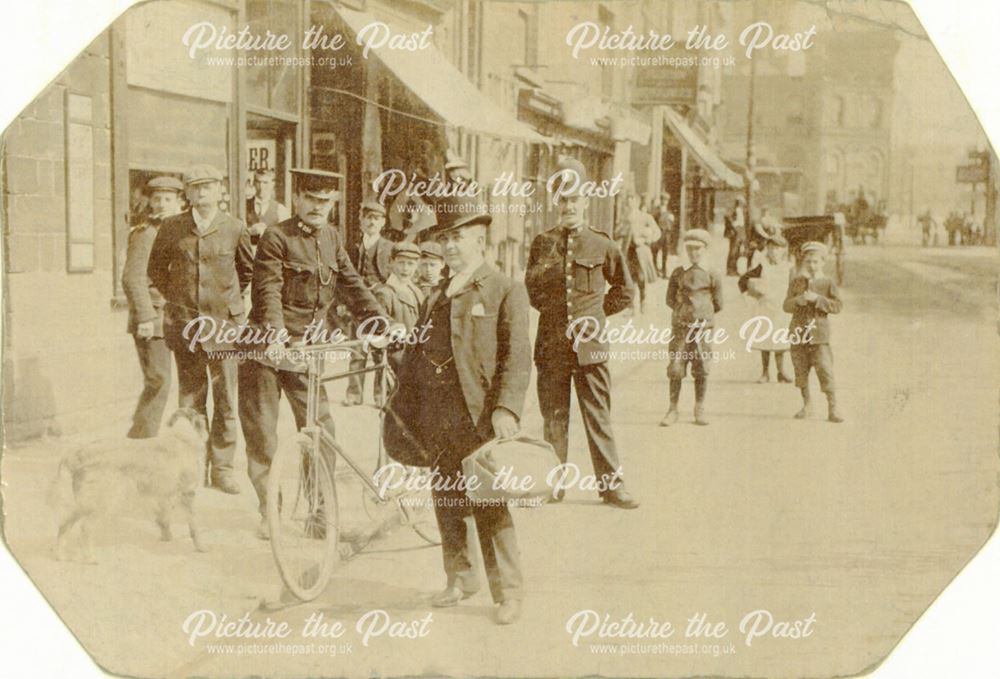 Man with a parcel and policemen, West Bars, c 1910