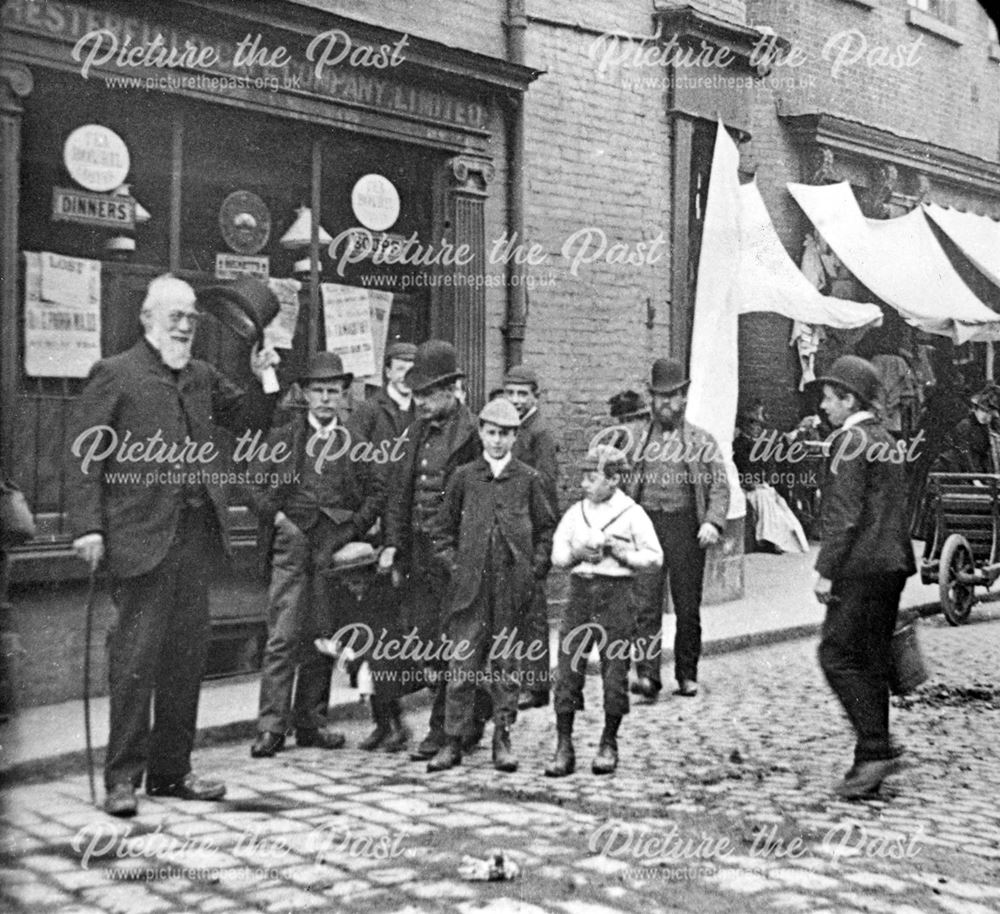 Group outside the 'Beehive' shop, Burlington Street c.1900