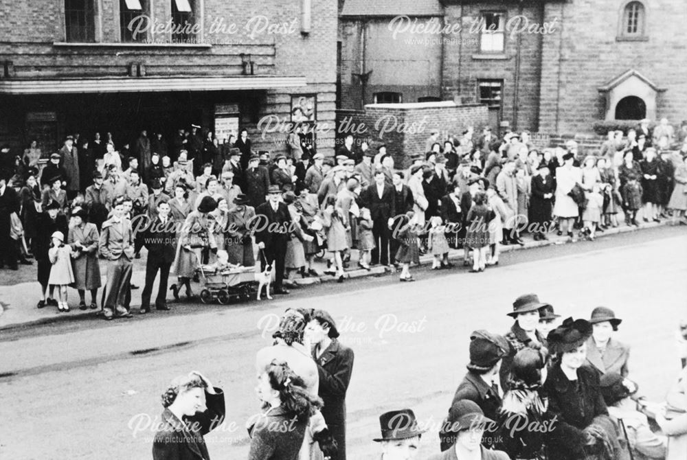 Crowds gathered to watch the V E Day Parade