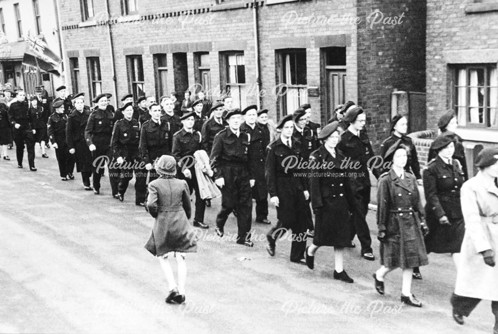 Civil Defence Personnel marching through Staveley