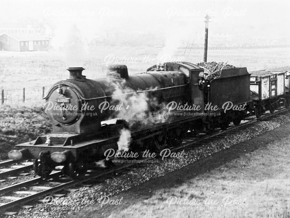 Steam locomotive (63701) class 'O4/3' and goods train on Staveley's Central Railway line