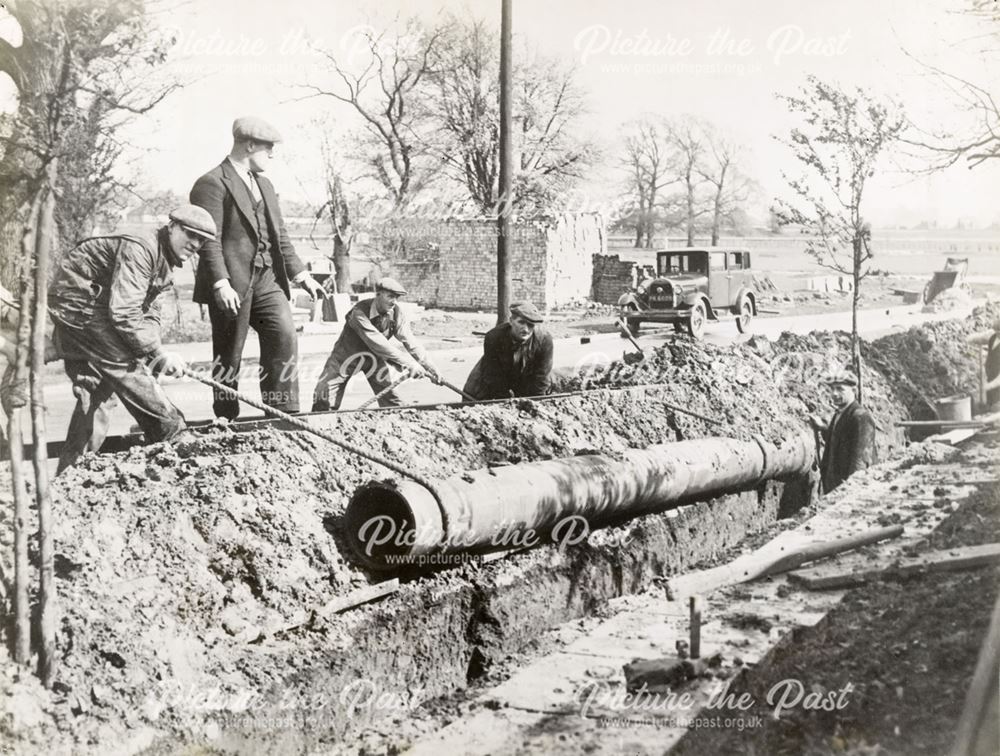 Men laying pipes at Devonshire Works