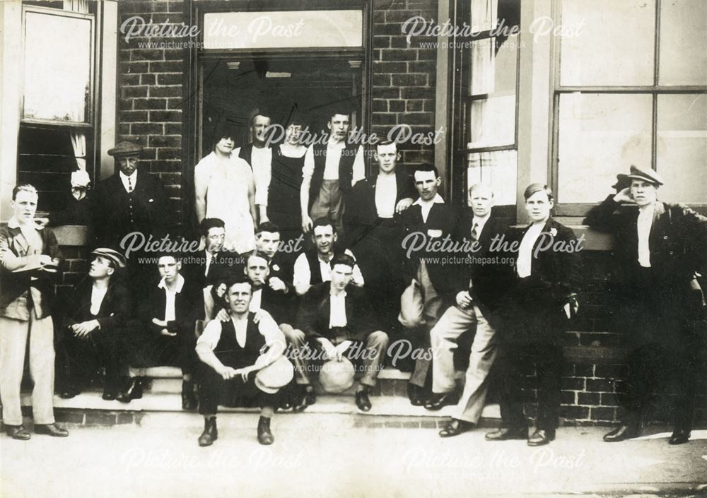 Crowd outside the New Inn, High Street, Stonebroom, c 1920