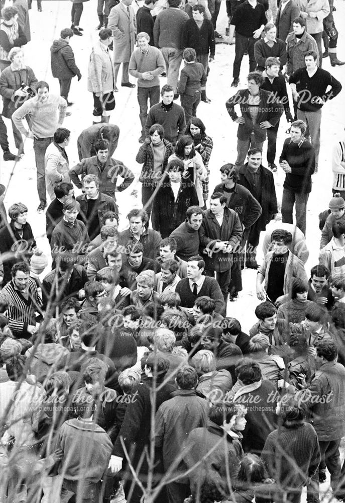 Shrovetide football in the snow in Nestle's Fields, Clifton Road, Ashbourne, 1969