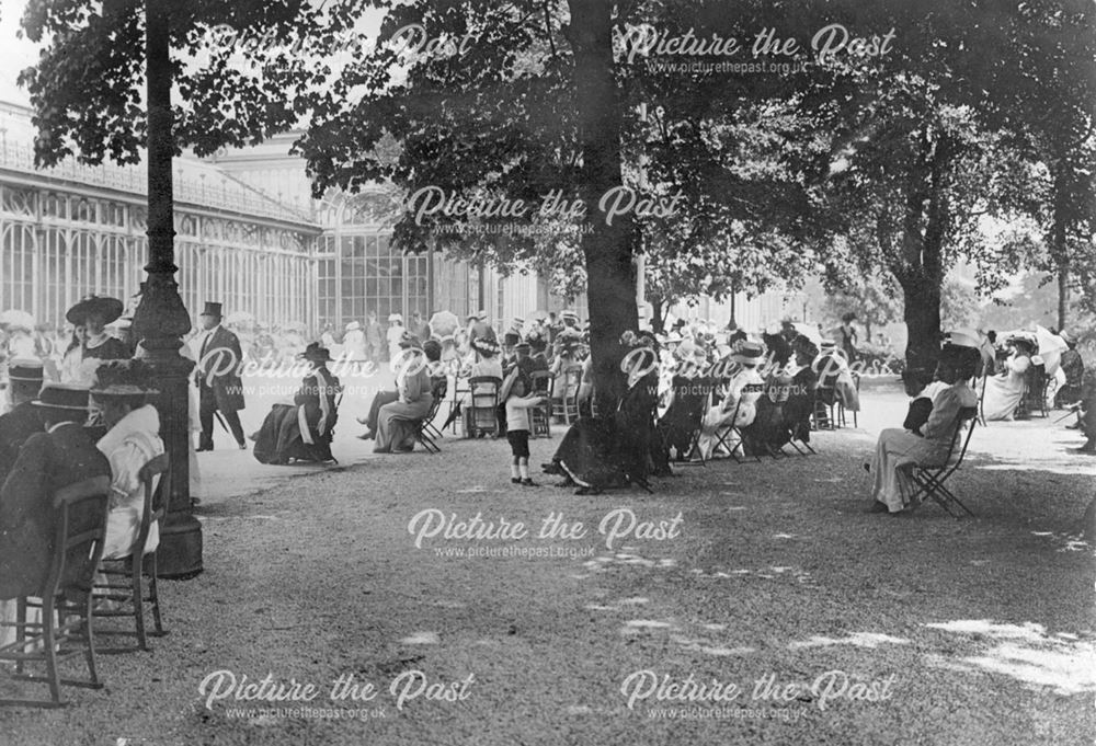 General scene showing people at leisure sitting by the Pavilions, Pavilion Gardens, Buxton