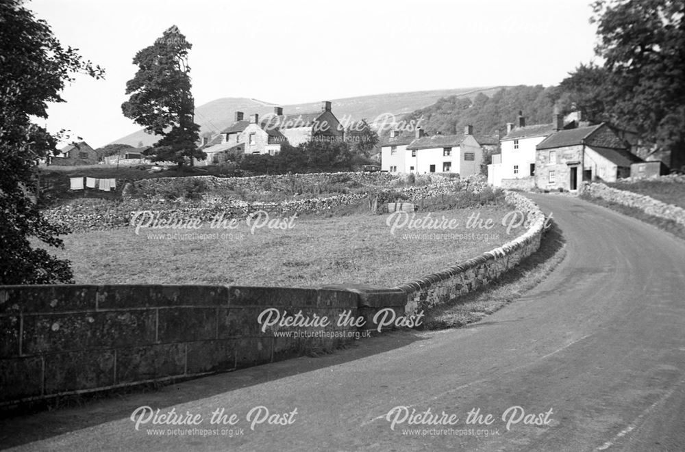 The village of Crowdecote with the Packhorse inn on the right of the picture