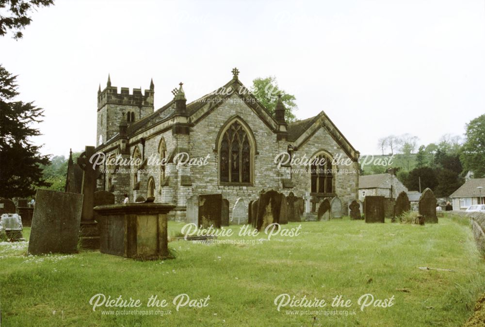 Church and graves of the Holy Trinity Parish Church of Ashford in the Water.