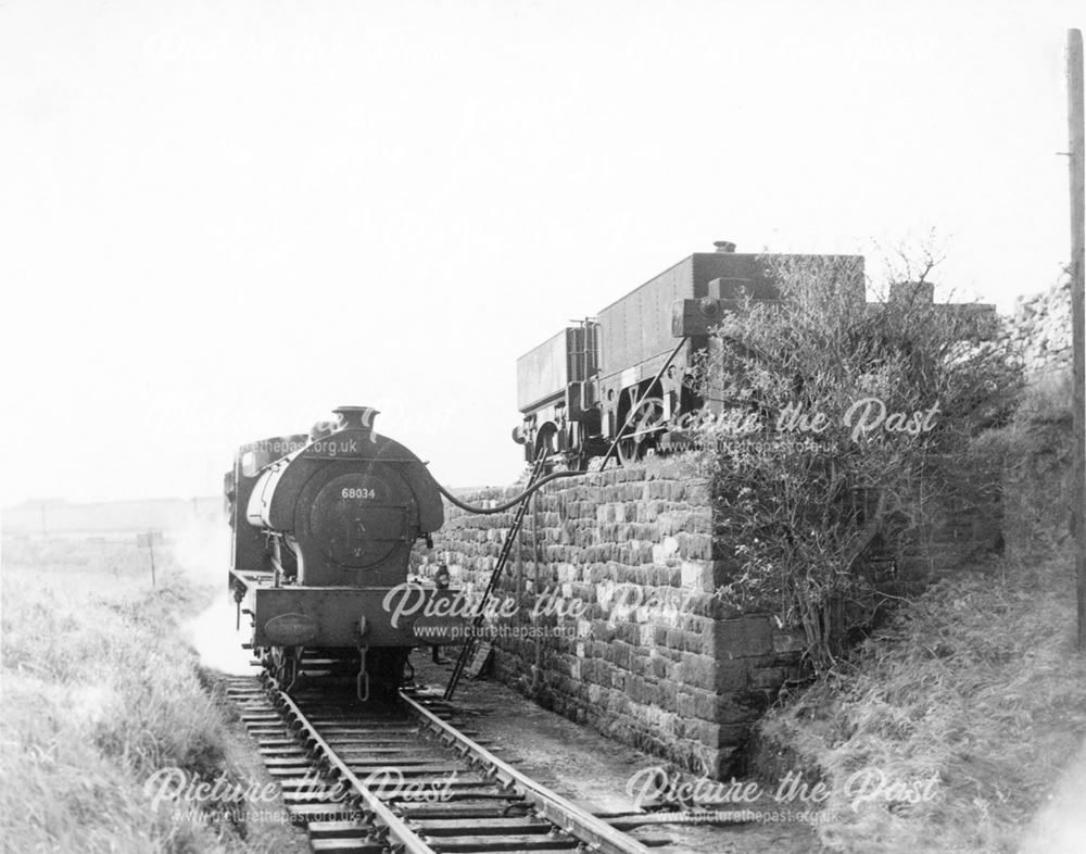 Saddletank Steam engine taking water on The Cromford and High Peak Railway, Longcliffe. 1957