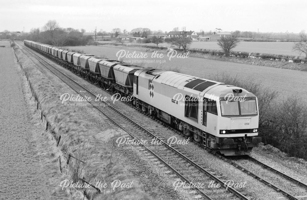 Class 60 locomotive approaching Barrow on Trent, 1993