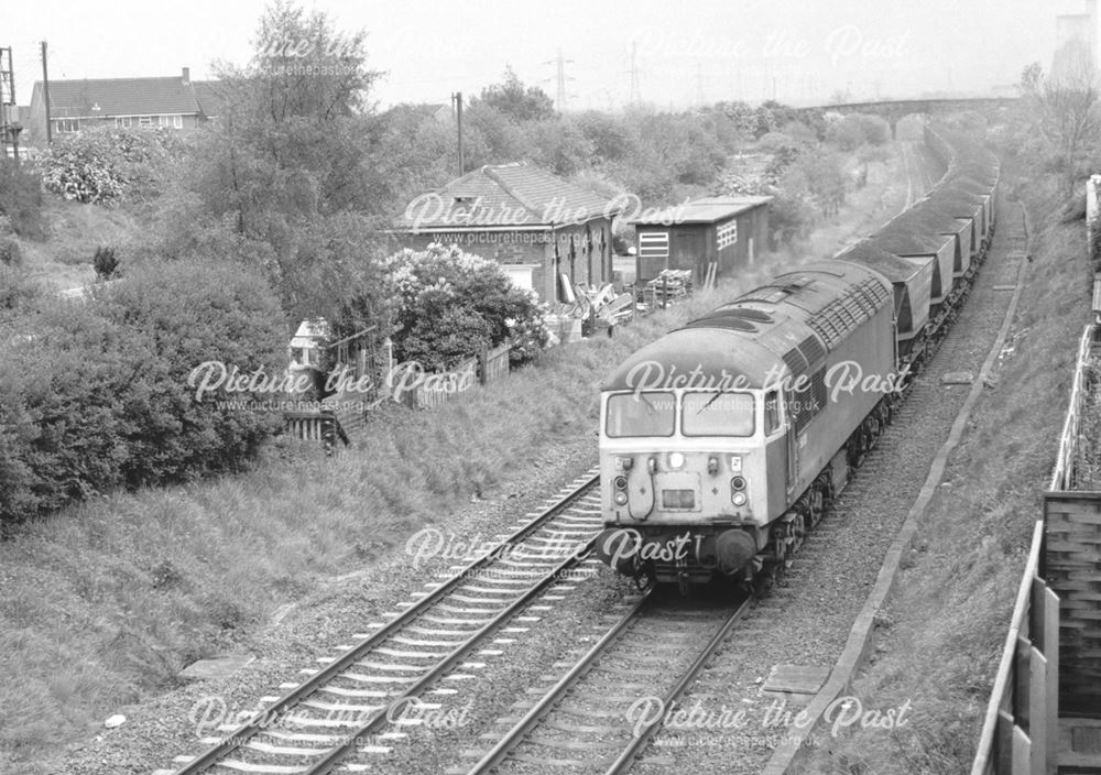 A coal train passing the old station