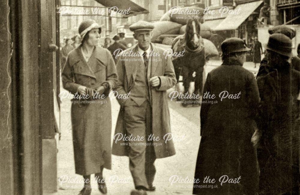 Mr and Mrs Samuel Middleton walking along Spring Gardens, Buxton