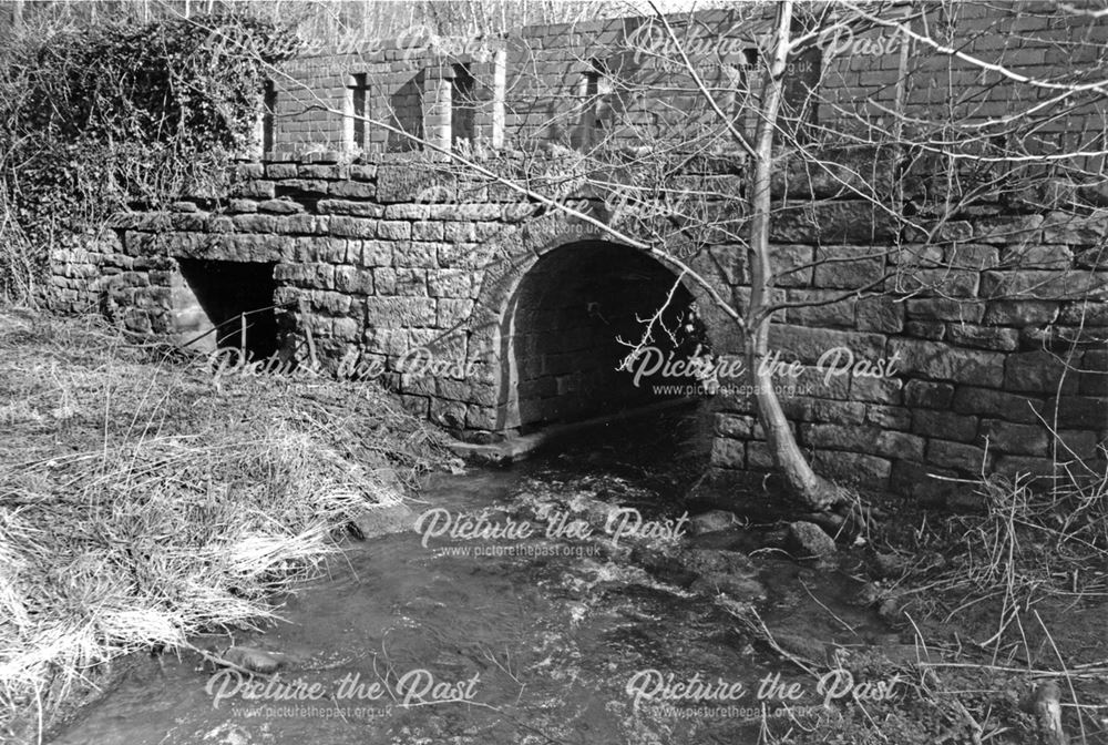 Disused bridge over stream