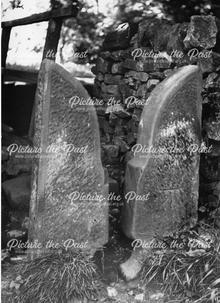 A carved stone stile in Beresford Dale