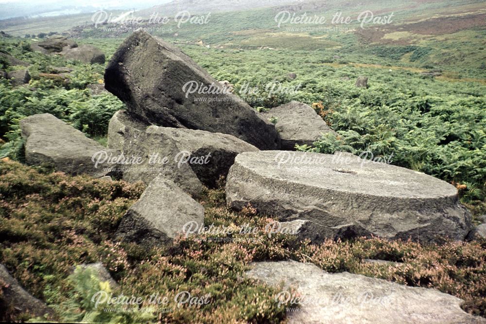 Abandoned millstone in unknown moorland of the peak district, c 1980s