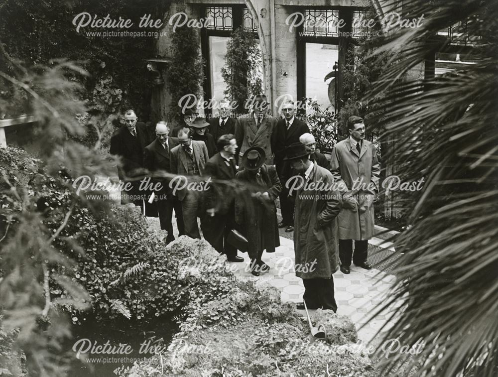 Group of Men in the Winter Gardens, Thornbridge Hall, Great Longstone, c 1930s