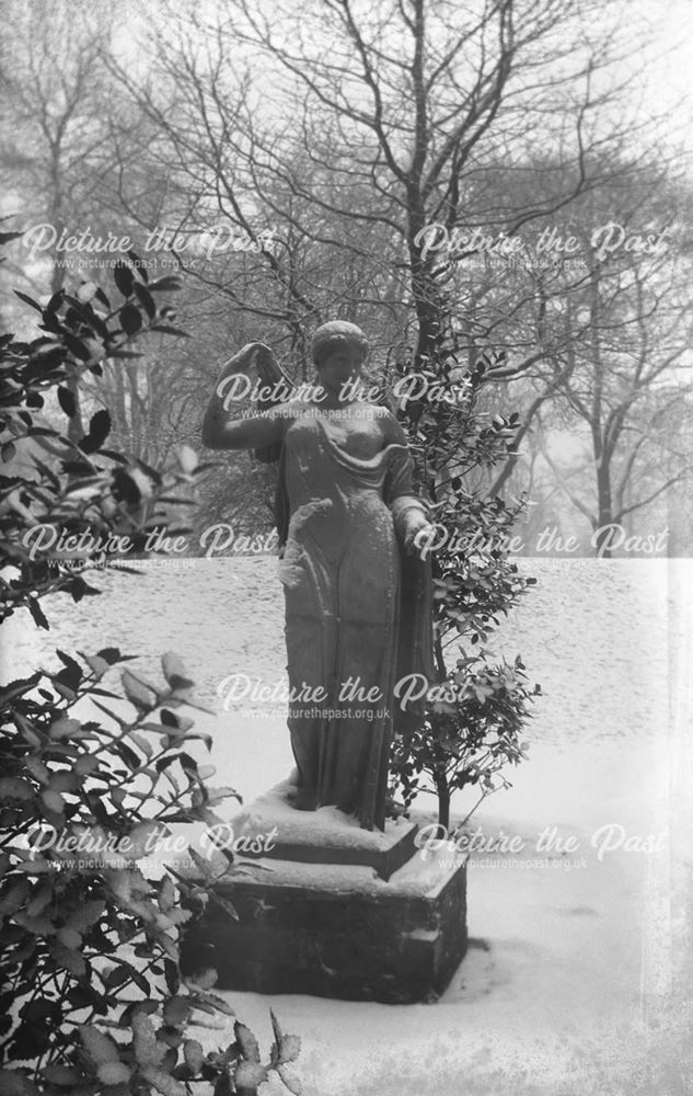 Classical statue in the snow at The Arboretum, Rose Hill, Derby, c 1914 ?